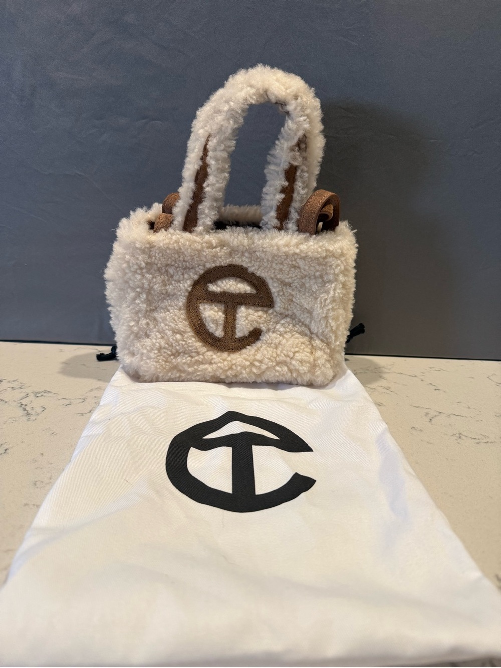 Telfar Cream Shearling Mini Bag with Brown Logo Trim